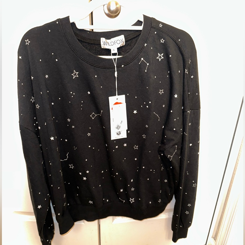 Wildfox blue sweater with stars size L